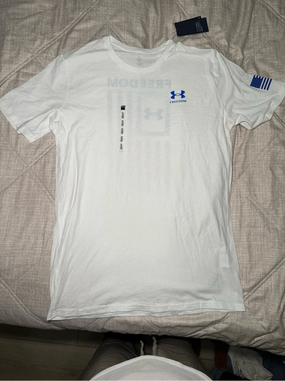 Under Armour White Short Sleeve Freedom Performance Tee with Blue Logo